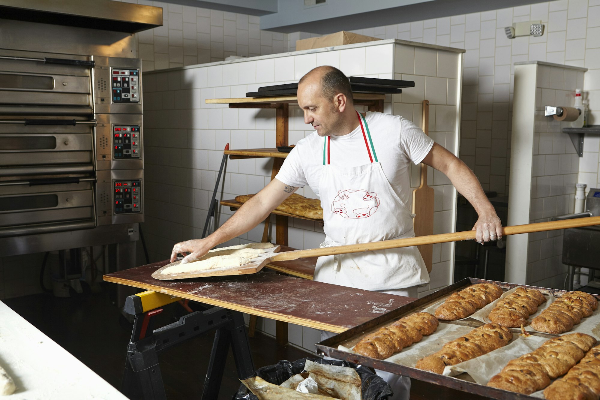 Baker working in bakery